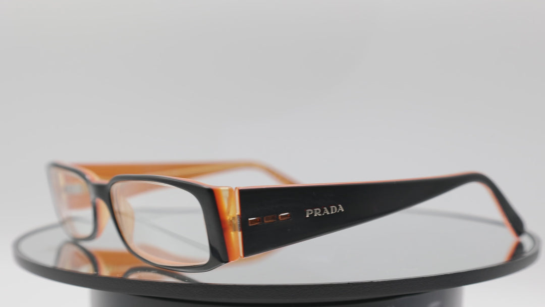 PRADA Black and Orange Oval shaped glasses