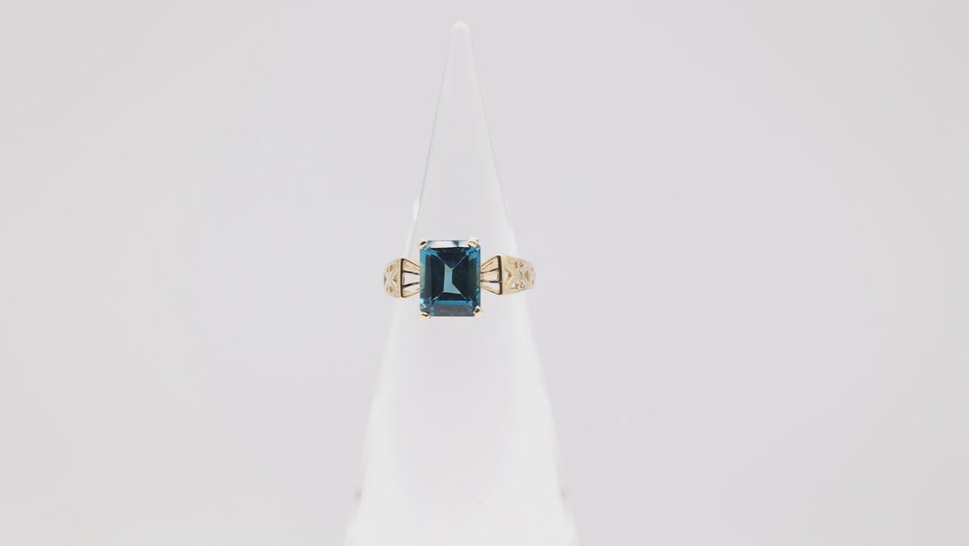 10k Yellow Gold Emerald Cut Blue Topaz Cocktail Ring - Size 7.5