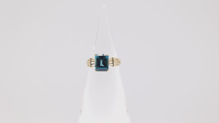 10k Yellow Gold Emerald Cut Blue Topaz Cocktail Ring - Size 7.5