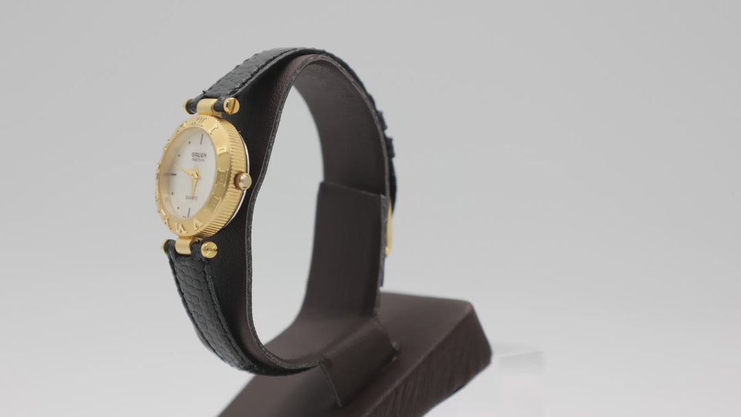 Gruen Precision Gold Tone Watch With Mother Of Pearl Dial And Black Leather Band