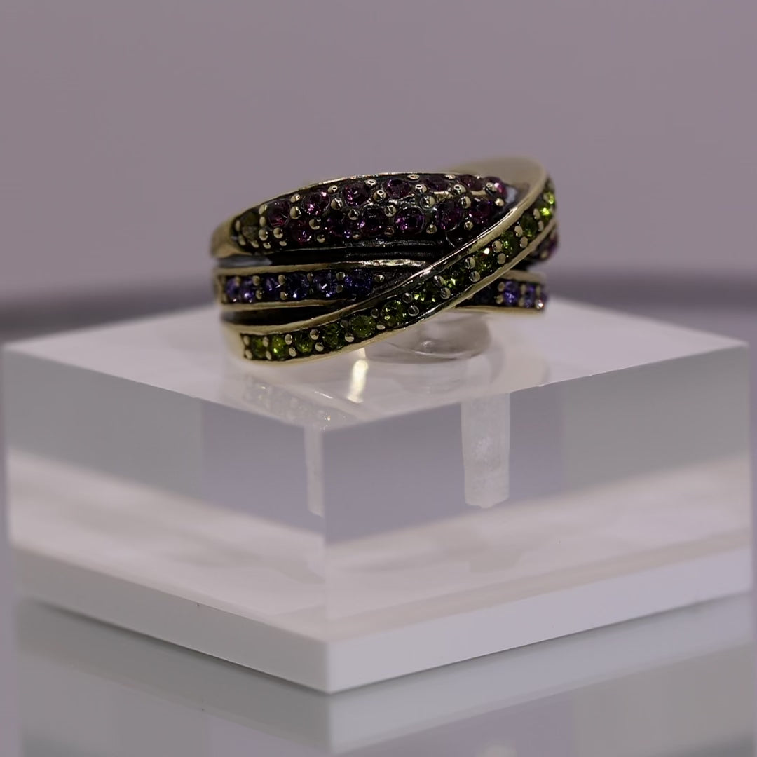 Heidi Daus Brass Crossover Ring with Colorful Purple & Green Crystals - Size 6