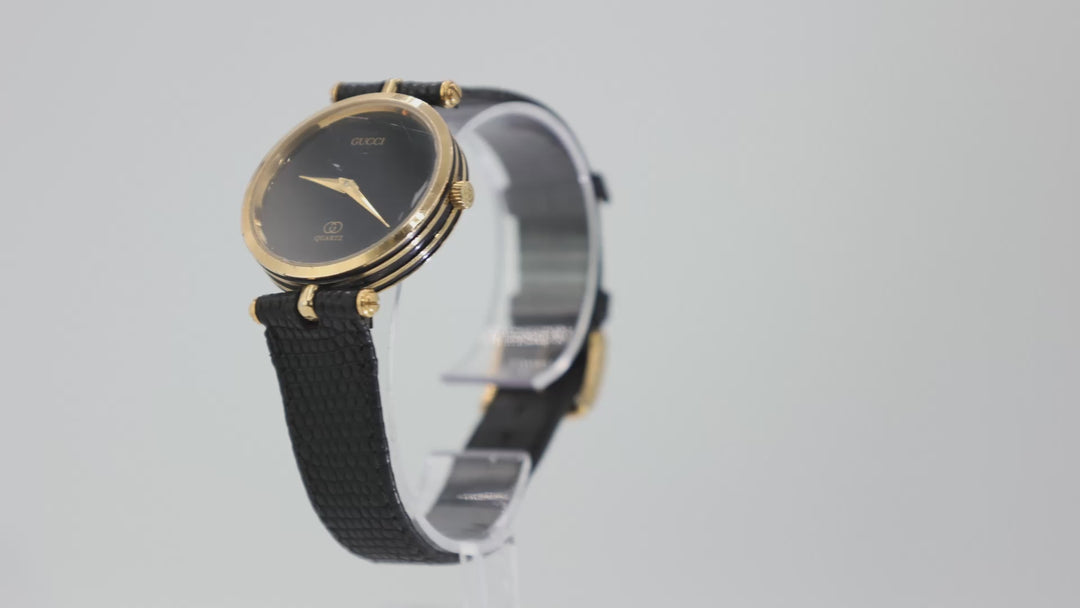 Gucci Black And Gold Tone Quartz Watch Luxury Timepiece