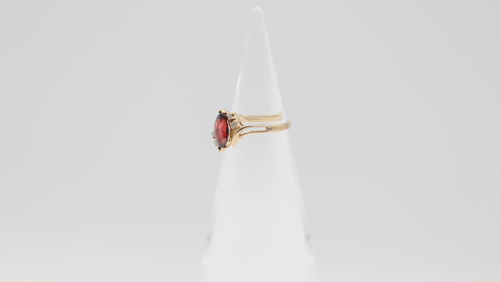 14k Yellow Gold .12ctw Diamonds Garnet Open Accent Bypass Ring Size 5