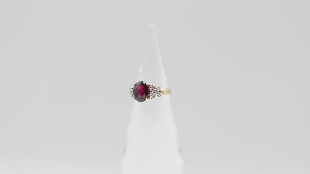 10k Yellow Gold with Butterfly Diamonds Oval Garnet Size 6.75