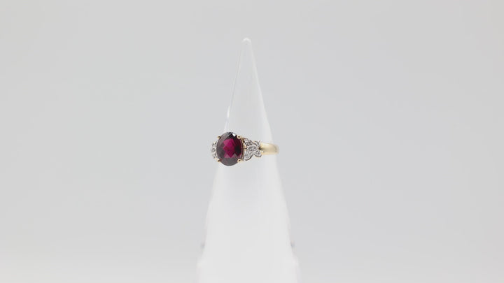 10k Yellow Gold with Butterfly Diamonds Oval Garnet Size 6.75