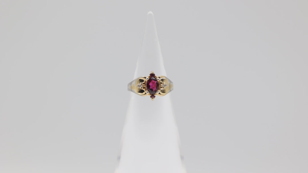 10k Yellow Gold 7x5mm Oval Garnet Stone with Diamond Accents Ring Size 5.75