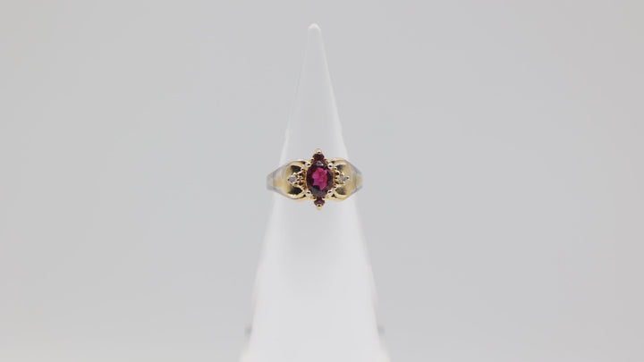 10k Yellow Gold 7x5mm Oval Garnet Stone with Diamond Accents Ring Size 5.75