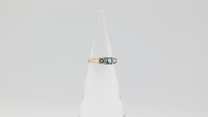 14k Yellow Gold Band with 3 Round Blue Topaz Stones