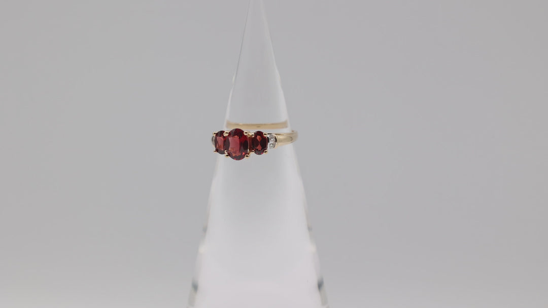 14K Yellow Gold Ring With 3 Garnets 8x6mm 6x4mm And 4 White Diamonds 2mm Size 9