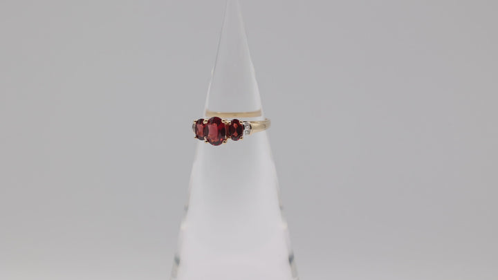 14K Yellow Gold Ring With 3 Garnets 8x6mm 6x4mm And 4 White Diamonds 2mm Size 9