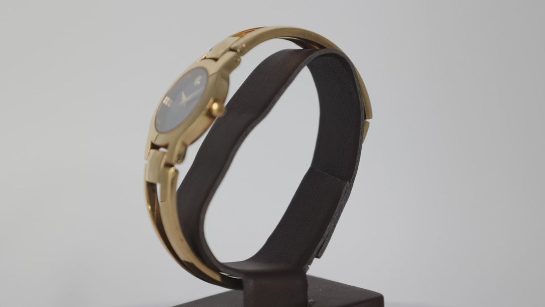 Movado Amorosa Gold Tone Womens Bangle Watch Elegant Accessory