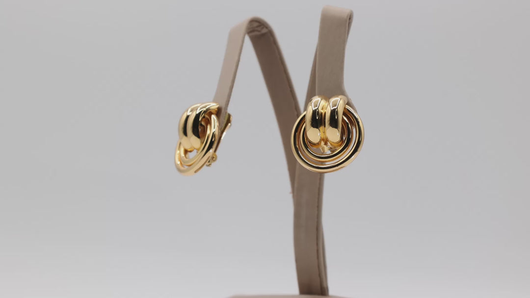 Burberrys Authentic Gold Tone Knot Clip On Earrings