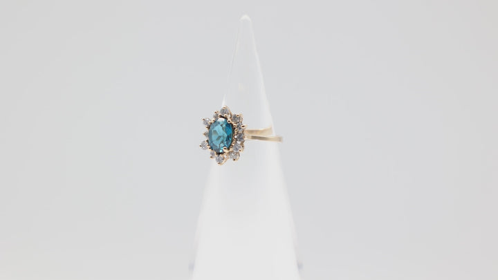 14k Yellow Gold 8mm x 6mm Oval Blue Topaz Ring Size 5